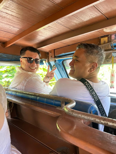 Two travelers in a small tourist bus in Khaolak